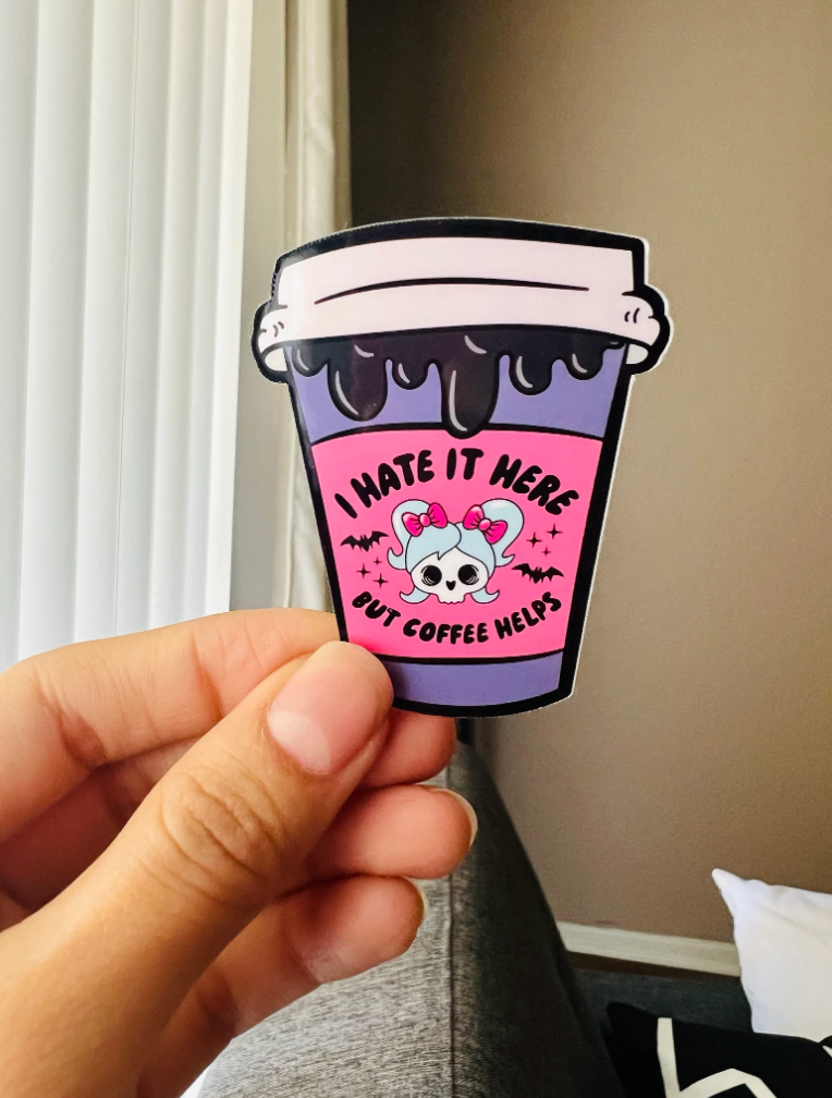 I Hate It Here But Coffee Helps Sticker